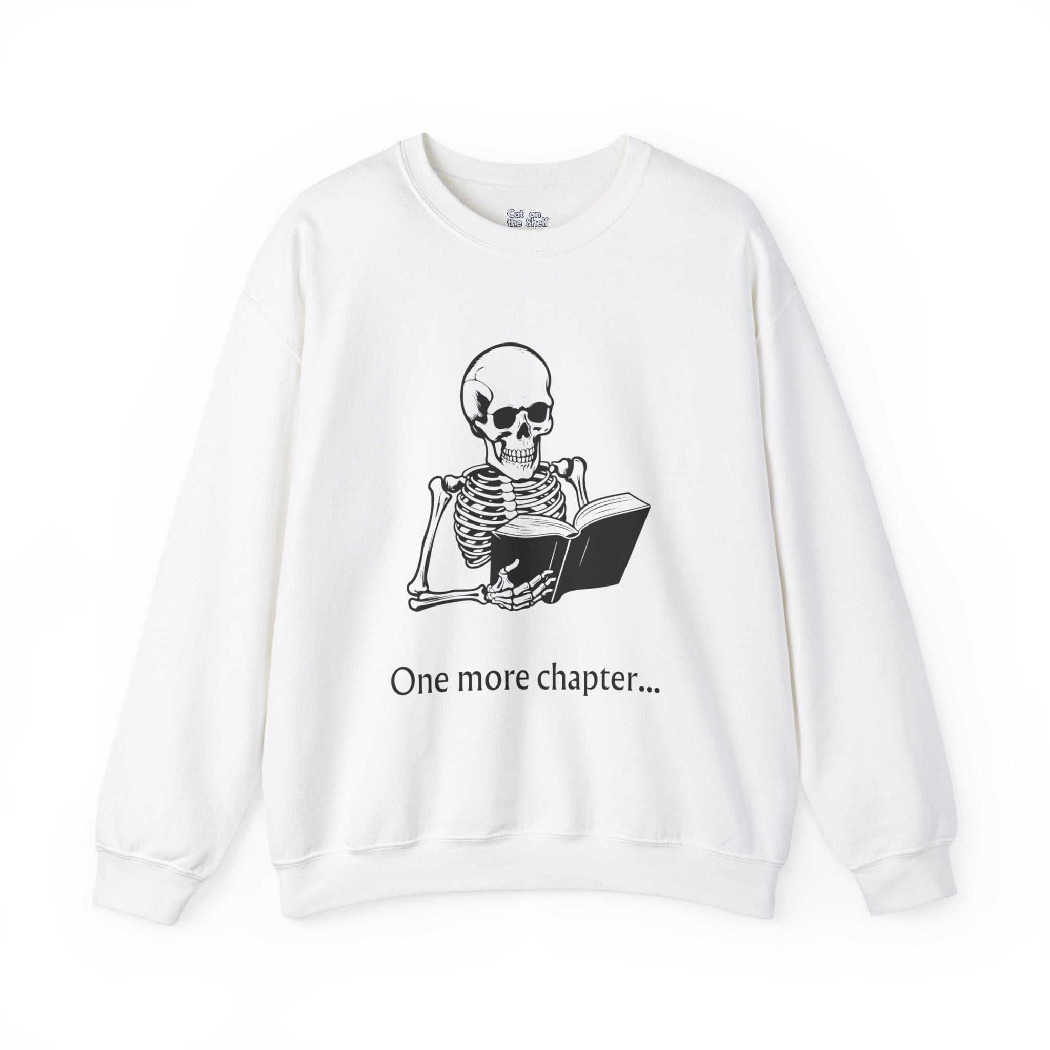 One More Chapter Reading Skeleton with Book Unisex Heavy Blend™ Crewneck Sweatshirt