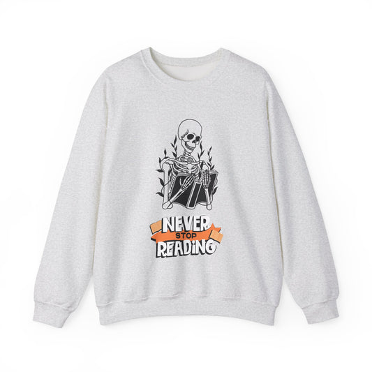 Never Stop Reading Skeleton with Book Unisex Heavy Blend™ Crewneck Sweatshirt