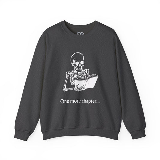 One More Chapter Reading Skeleton with Book Unisex Heavy Blend™ Crewneck Sweatshirt